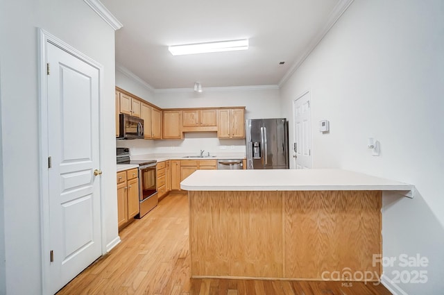 kitchen with sink, crown molding, light brown cabinets, stainless steel appliances, and light hardwood / wood-style floors