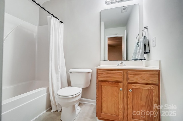 full bathroom featuring vanity, shower / tub combo, and toilet