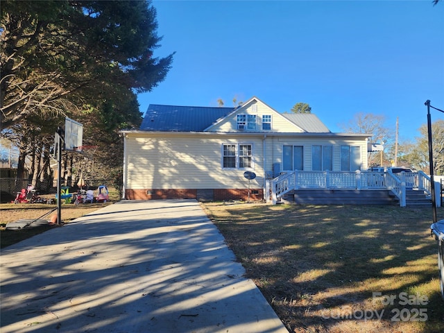 exterior space featuring a wooden deck