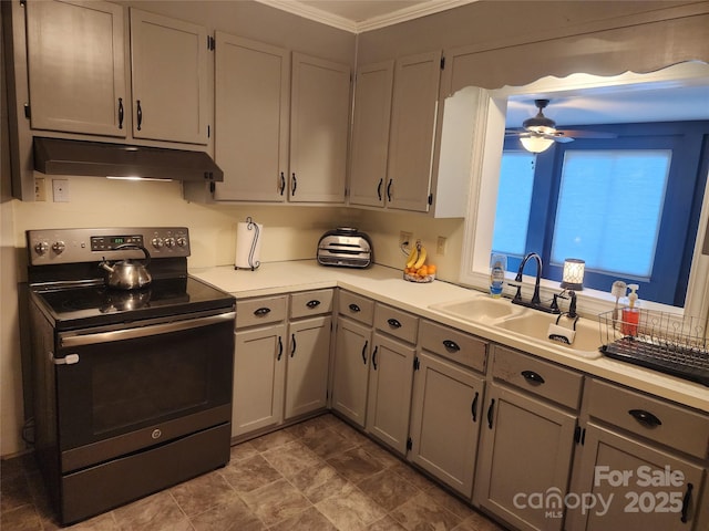 kitchen with ornamental molding, ceiling fan, sink, gray cabinets, and stainless steel range with electric cooktop