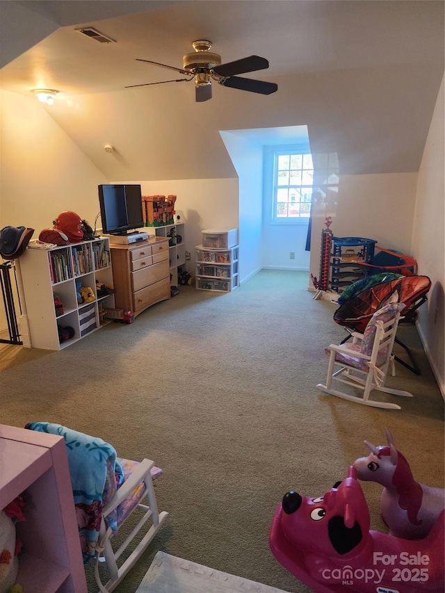 bonus room featuring carpet flooring, vaulted ceiling, and ceiling fan