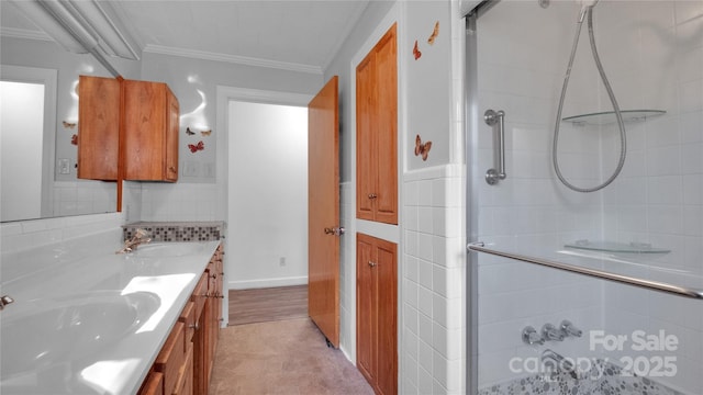 bathroom featuring vanity, walk in shower, and ornamental molding