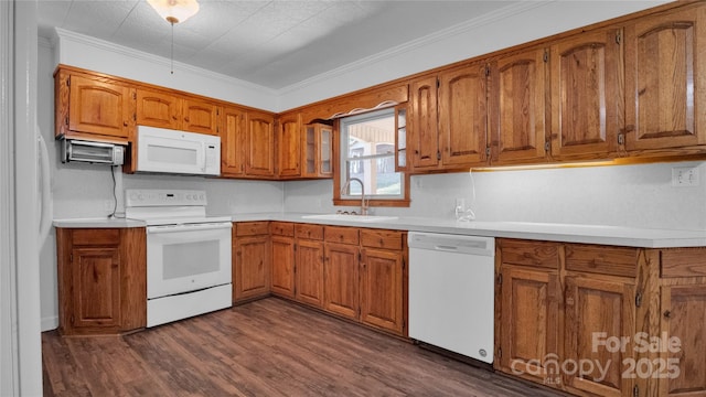 kitchen featuring white appliances, dark hardwood / wood-style floors, crown molding, and sink