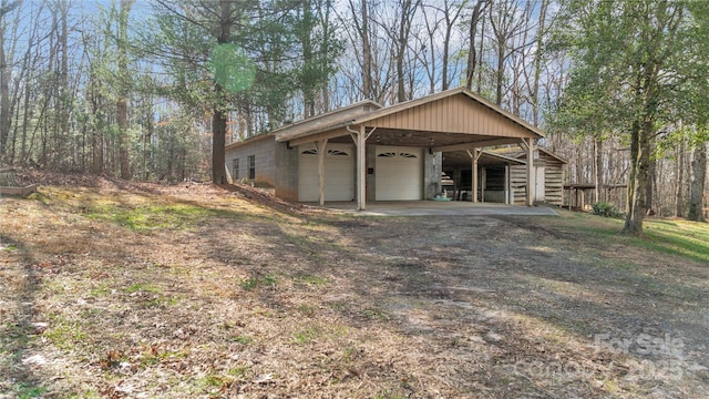 view of side of home with a garage