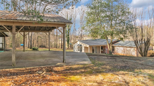 view of yard featuring a carport