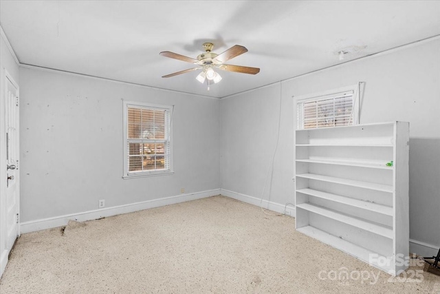 unfurnished room featuring ceiling fan