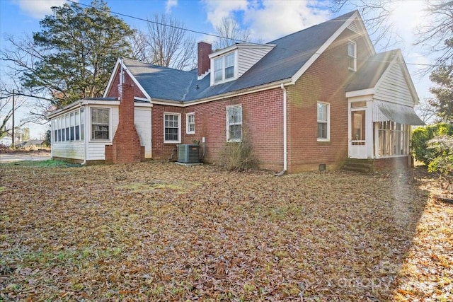 view of home's exterior featuring central AC unit