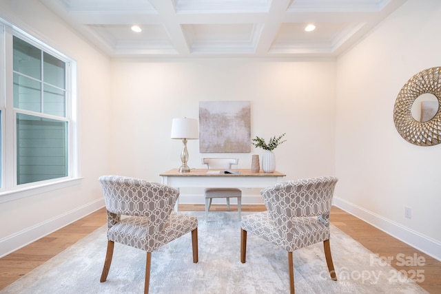 home office with coffered ceiling, light hardwood / wood-style floors, and beamed ceiling