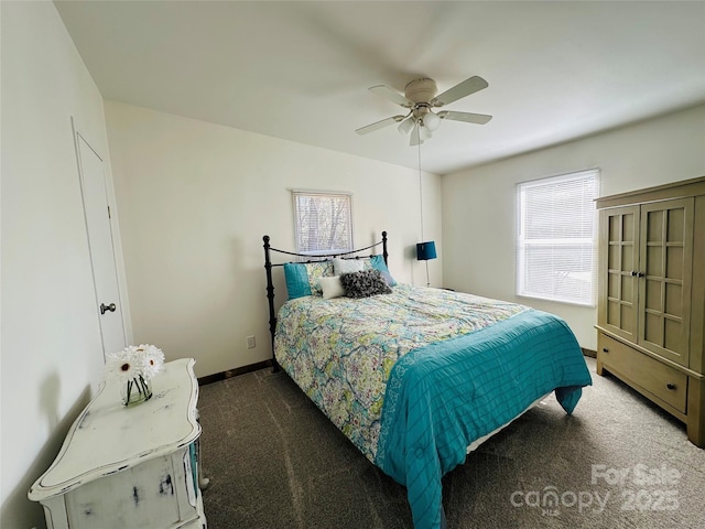 bedroom featuring ceiling fan and dark colored carpet