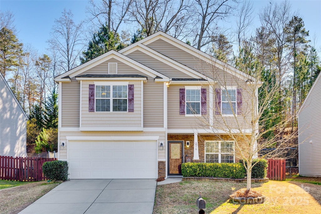 view of front of property with a garage