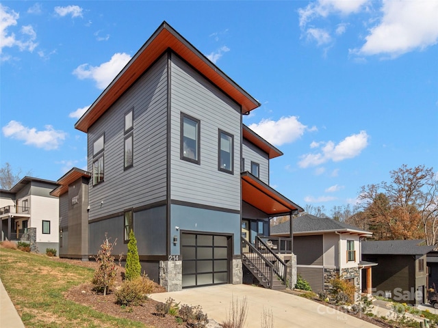 view of property exterior with a garage