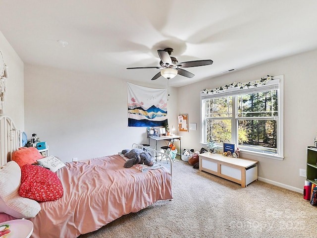 carpeted bedroom with ceiling fan