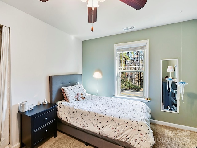 bedroom featuring ceiling fan and carpet floors