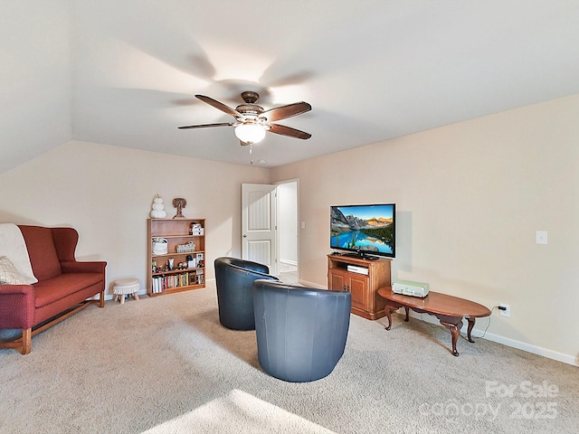 living room with carpet flooring, ceiling fan, and lofted ceiling