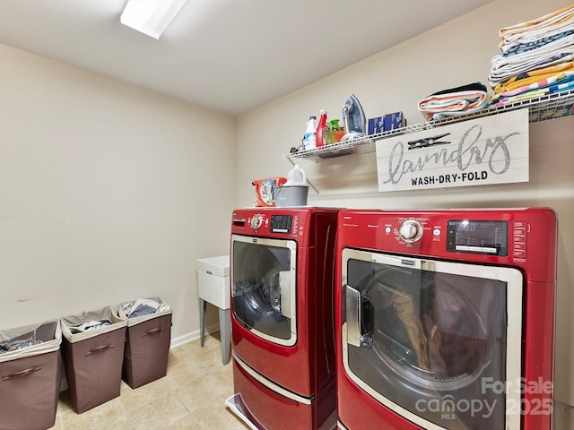 laundry room with washer and dryer