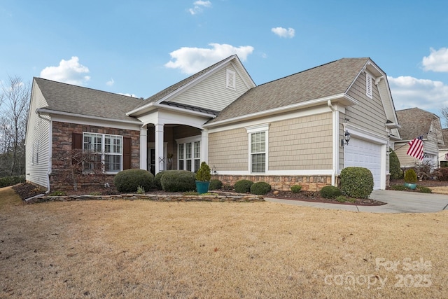 view of front property with a front yard and a garage