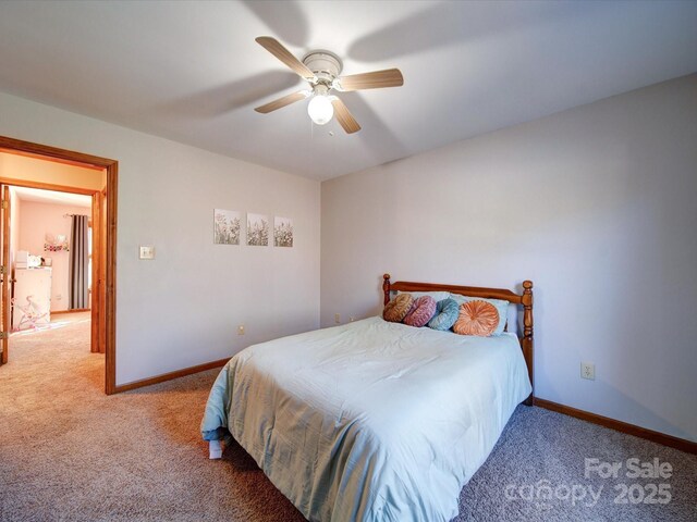 bedroom with ceiling fan and carpet floors