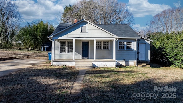 bungalow-style home featuring covered porch