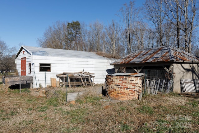 exterior space with an outbuilding