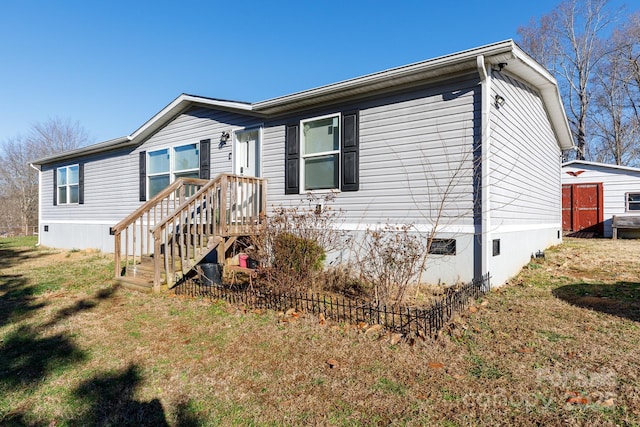 view of property exterior with a yard