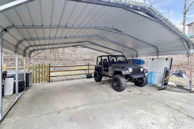 view of vehicle parking featuring a carport