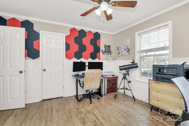 office area featuring crown molding, hardwood / wood-style flooring, and ceiling fan