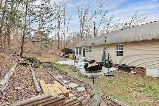 back of house with a patio