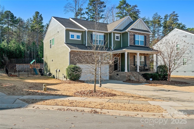 craftsman-style house with covered porch and a garage