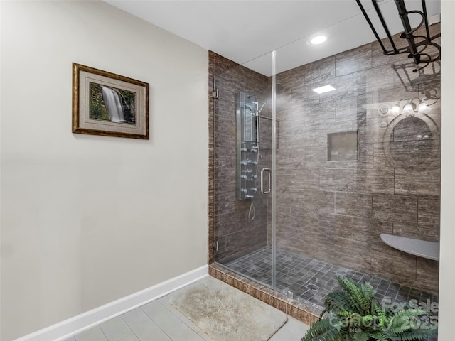 bathroom featuring tile patterned floors and an enclosed shower