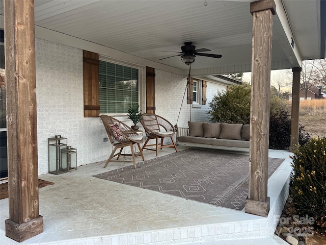 view of patio featuring a ceiling fan and covered porch