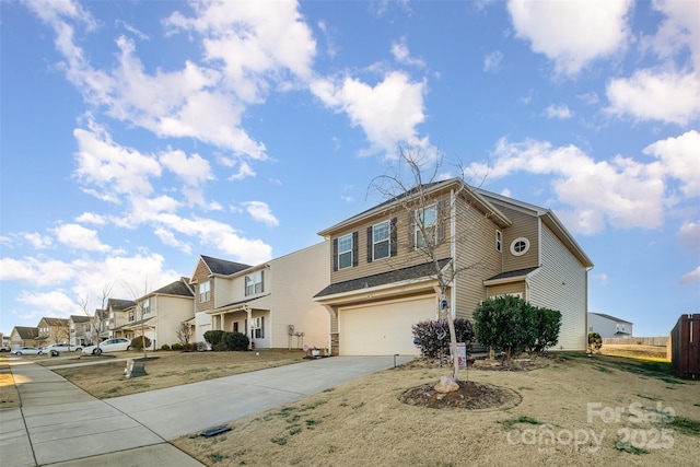 front of property with a garage