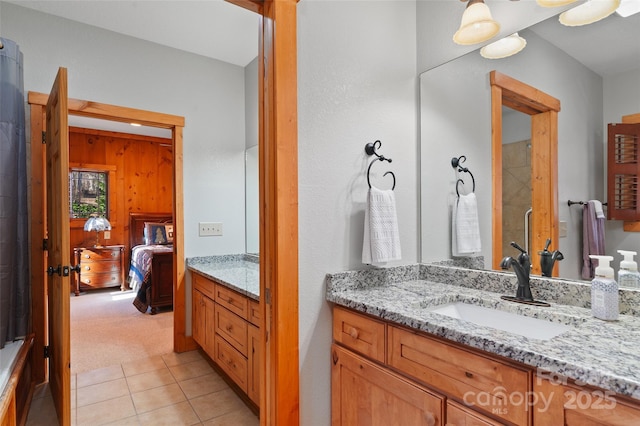 bathroom featuring tile patterned floors and vanity