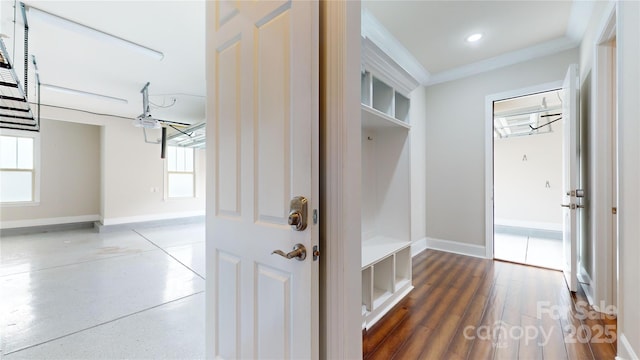 mudroom with plenty of natural light and ornamental molding