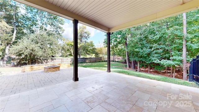 view of patio featuring an outdoor fire pit