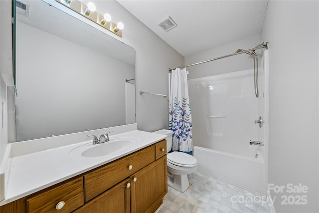 full bathroom with vanity, shower / tub combo with curtain, a textured ceiling, and toilet