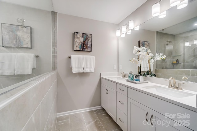 bathroom with vanity and a tile shower