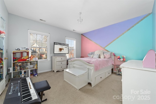 bedroom featuring light colored carpet and vaulted ceiling