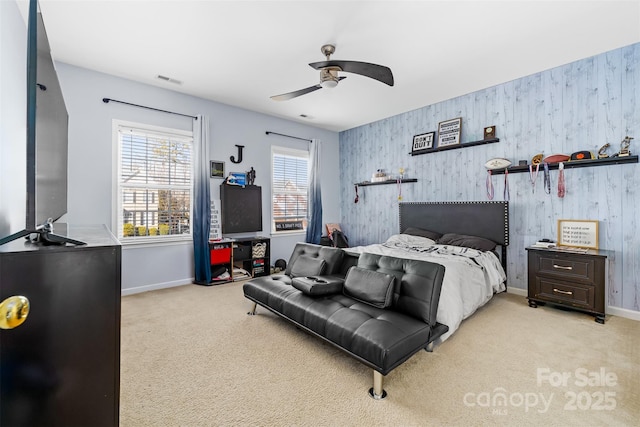 carpeted bedroom with ceiling fan