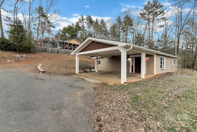 view of front of house with a carport