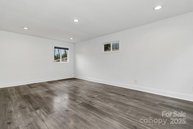 empty room featuring dark hardwood / wood-style floors