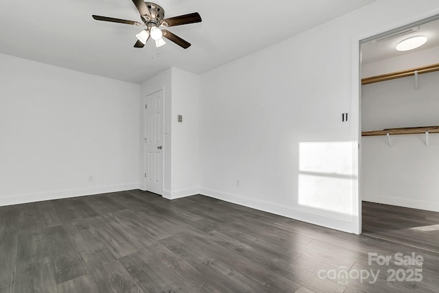 interior space with a closet, dark wood-type flooring, and ceiling fan