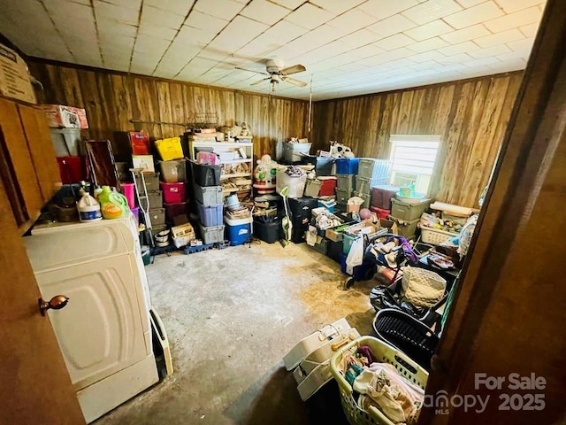 storage area featuring washer / dryer and ceiling fan