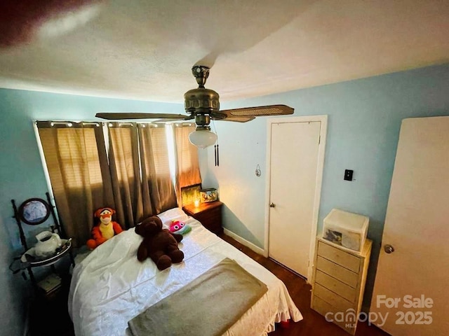 bedroom featuring ceiling fan