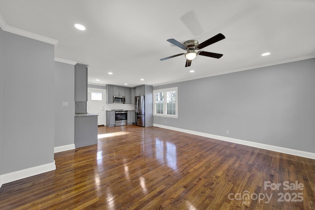 unfurnished living room with dark wood-type flooring, ceiling fan, and ornamental molding