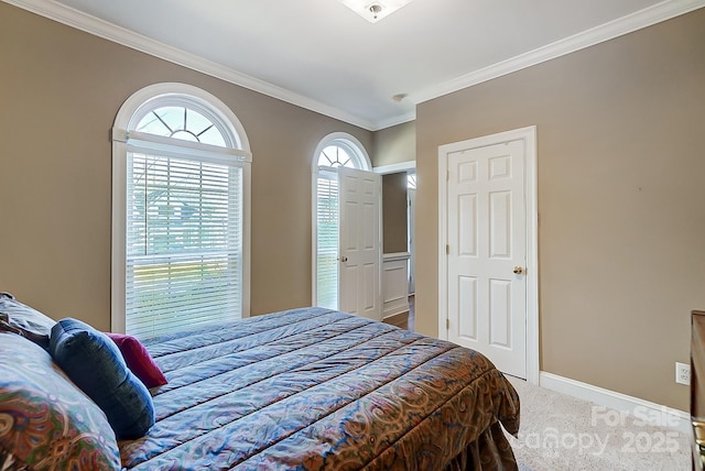 carpeted bedroom with crown molding