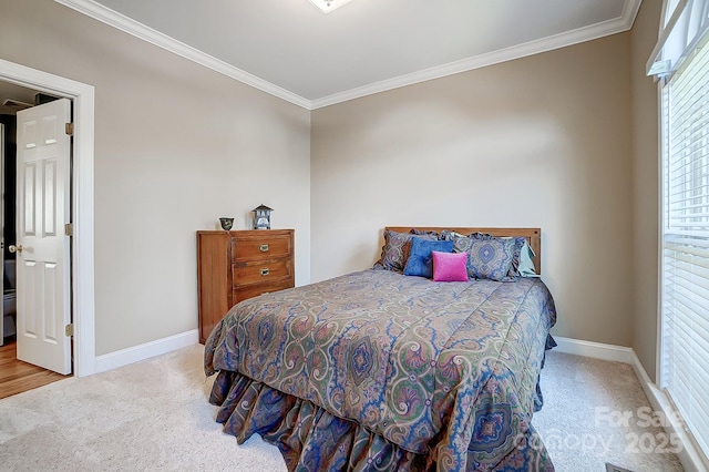 carpeted bedroom with multiple windows and ornamental molding