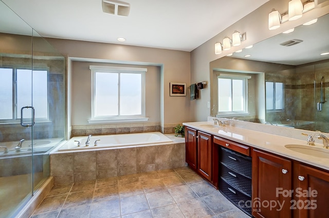 bathroom featuring separate shower and tub and vanity