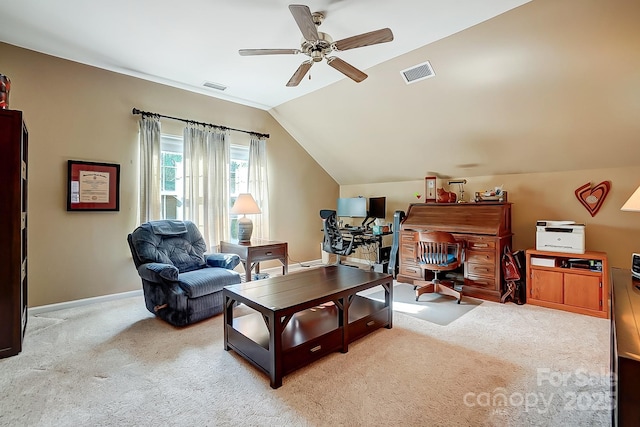 carpeted living room featuring ceiling fan and lofted ceiling