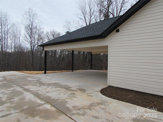 view of patio / terrace featuring a carport