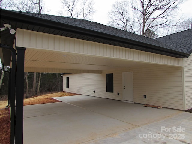 exterior space with a carport